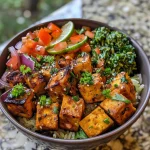 A close-up image of vibrant chili lime tofu bowls with colorful vegetables.