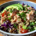 A colorful Spicy Tuna Quinoa Salad Bowl showcasing vibrant ingredients.