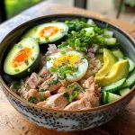Close-up of a Tuna Rice Bowl with vibrant colors and toppings.