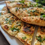 Close-up side view of a golden brown high protein flatbread with a crispy texture.
