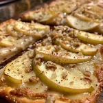 Close-up of Sweet and Spicy Apple Flatbread topped with sliced apples and pepper jack cheese.